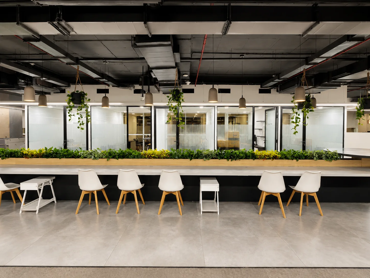 Office Collaboration Counter and Glass Cabins by IndecSpace