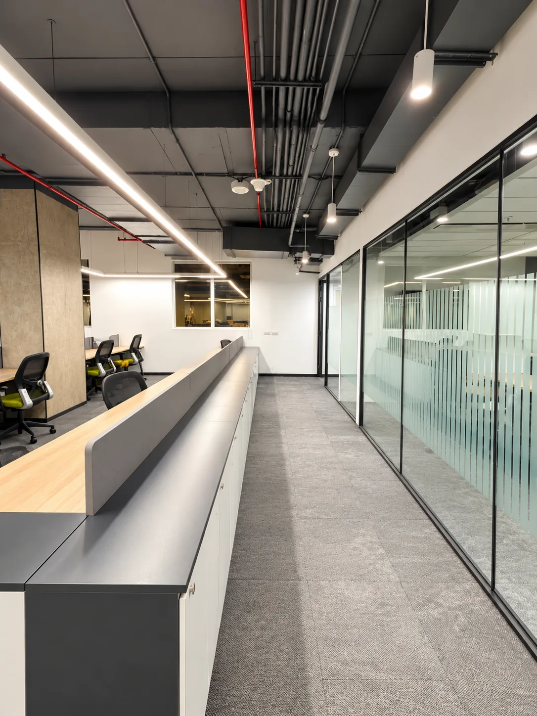 Office Corridor with Storage Unit and Glass Partitions by IndecSpace